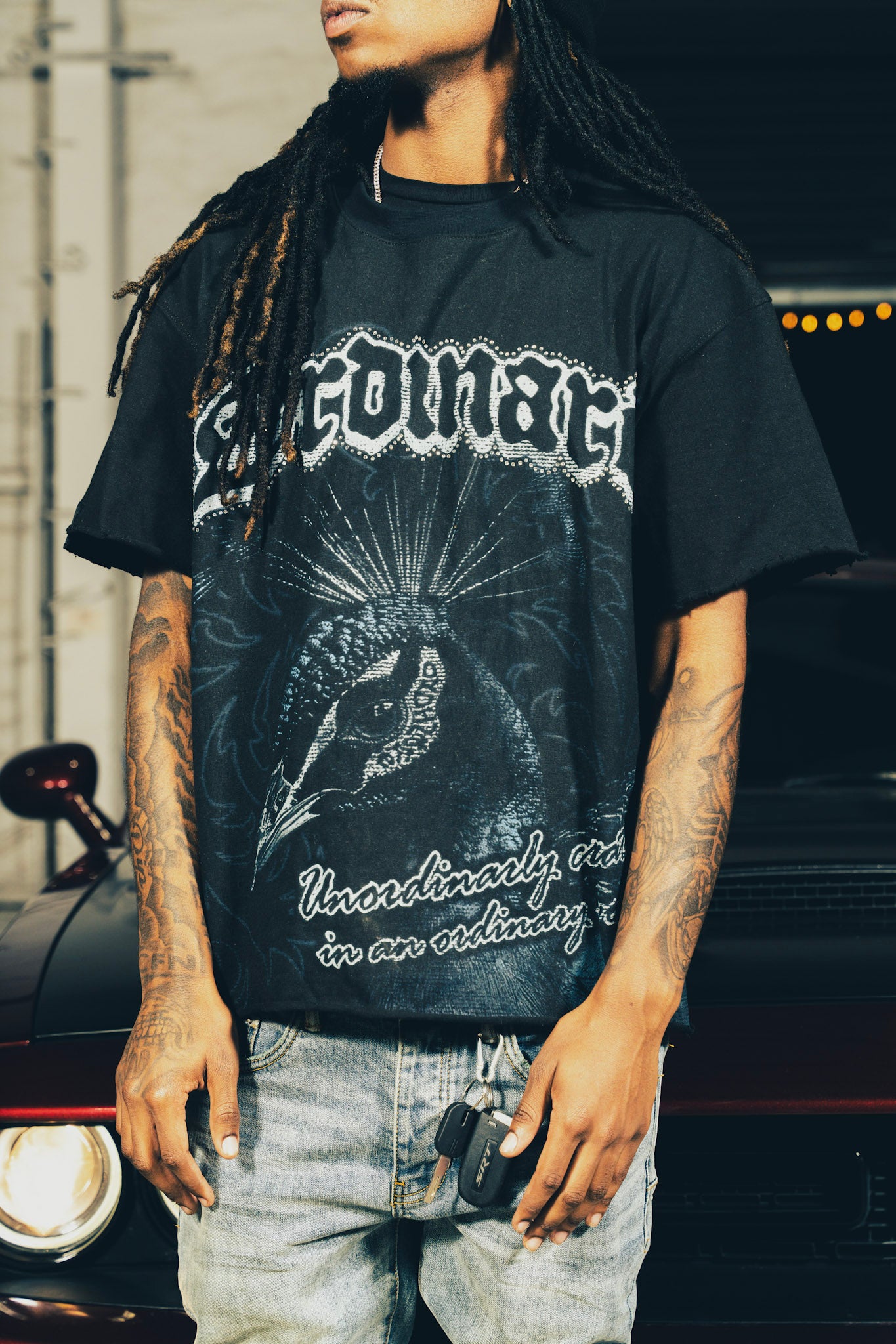Ordinare Peacock T-shirt